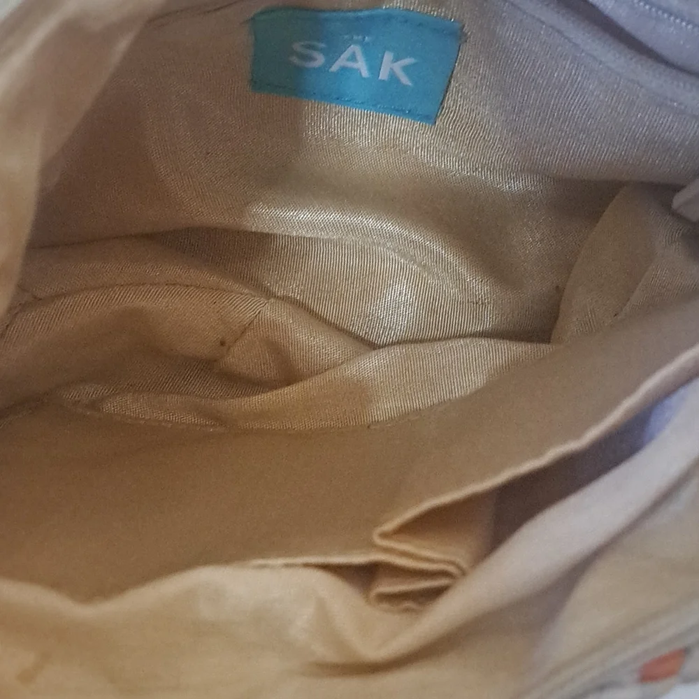 The Sak hobo style woven ribbon handbag